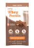 swiig Chai Latte whey protein package with an image of a glass of milk and spices.